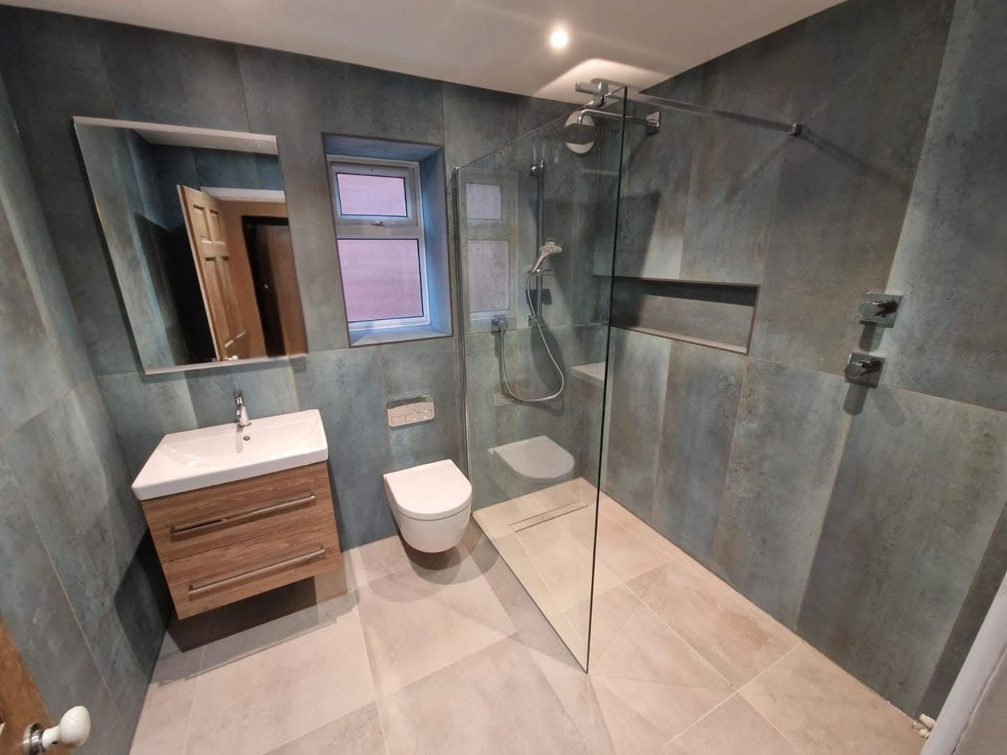 grey concrete tile walk in shower