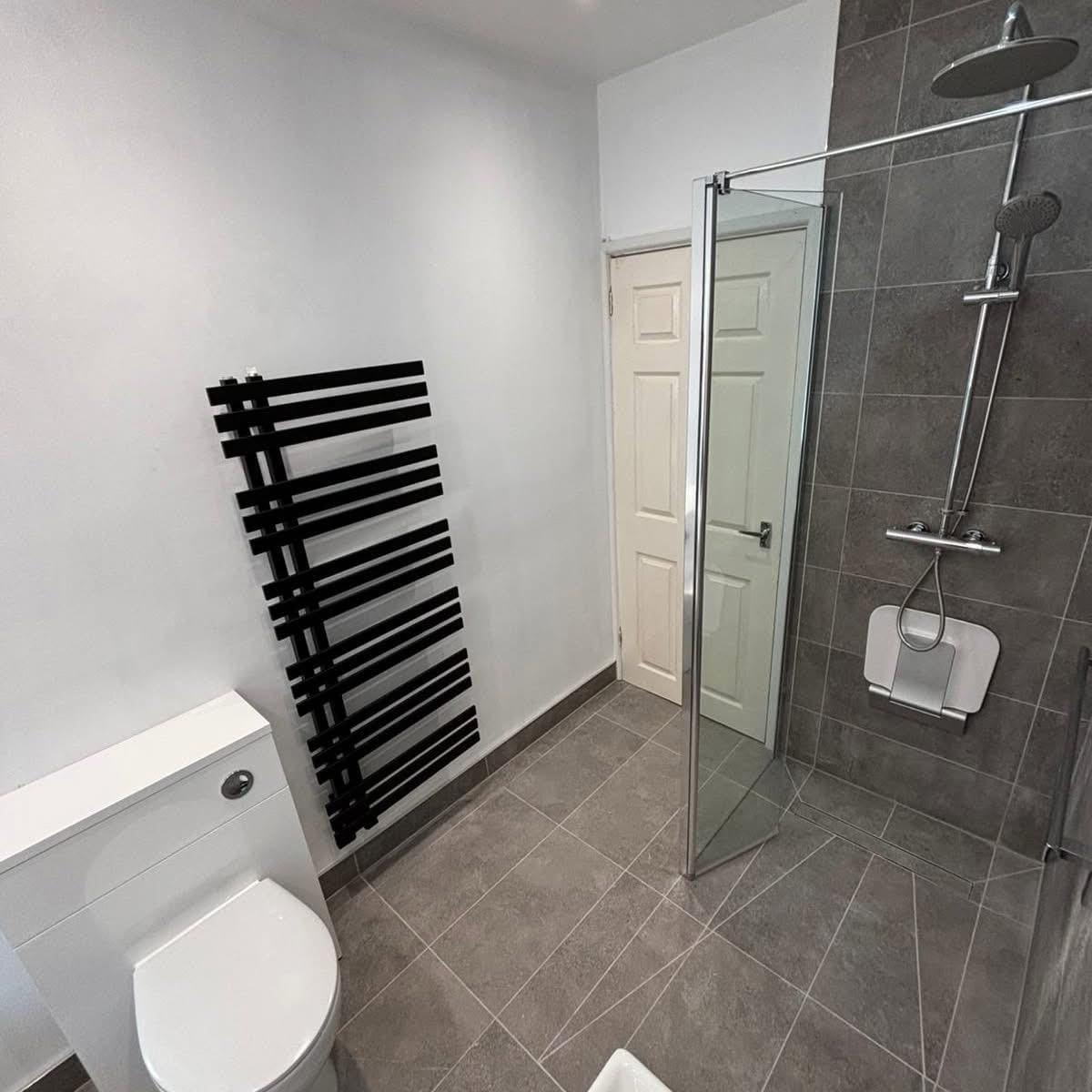 nottingham grey tile shower black radiator
